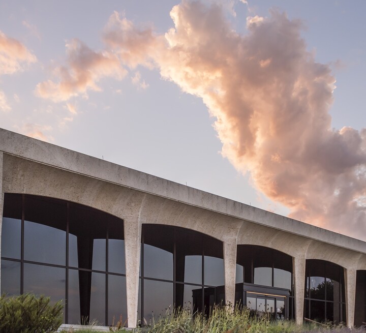 Façade of the Carter under an early evening sky.