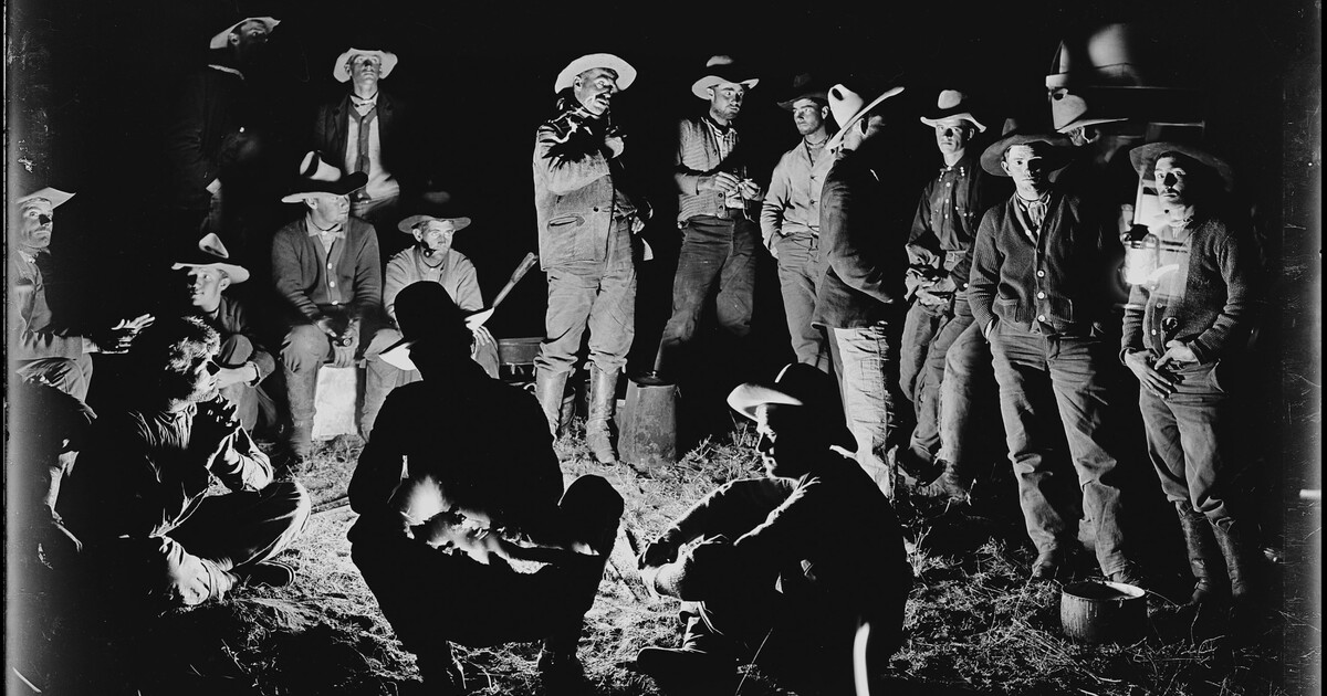 Cowpunchers of the Matador listening to the "Pitchfork Kid" Billy
